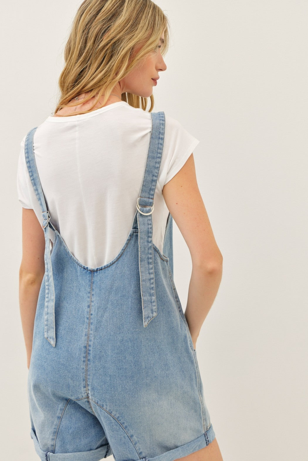 WASHED DENIM ROMPER WITH FRONT POCKETS