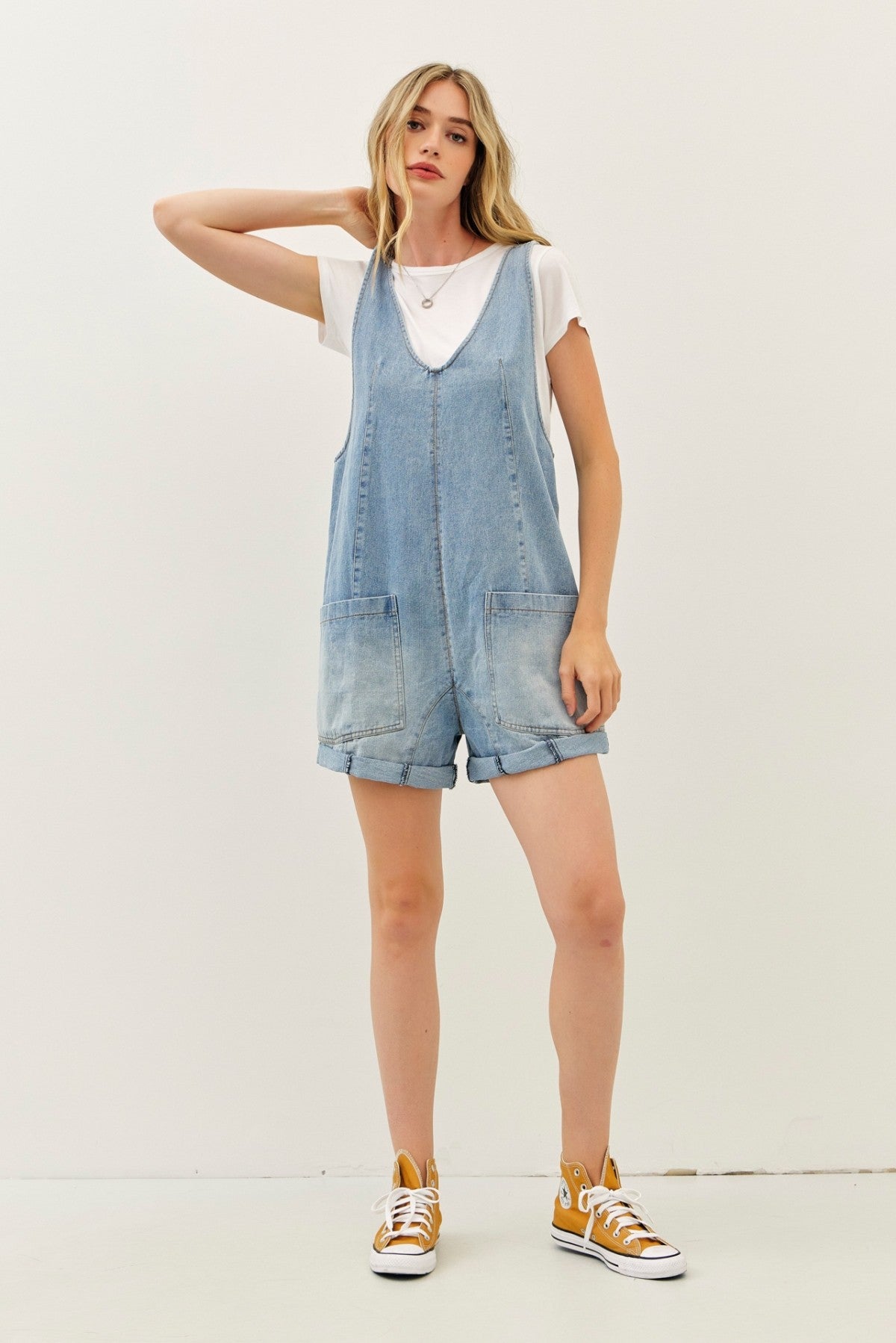 WASHED DENIM ROMPER WITH FRONT POCKETS