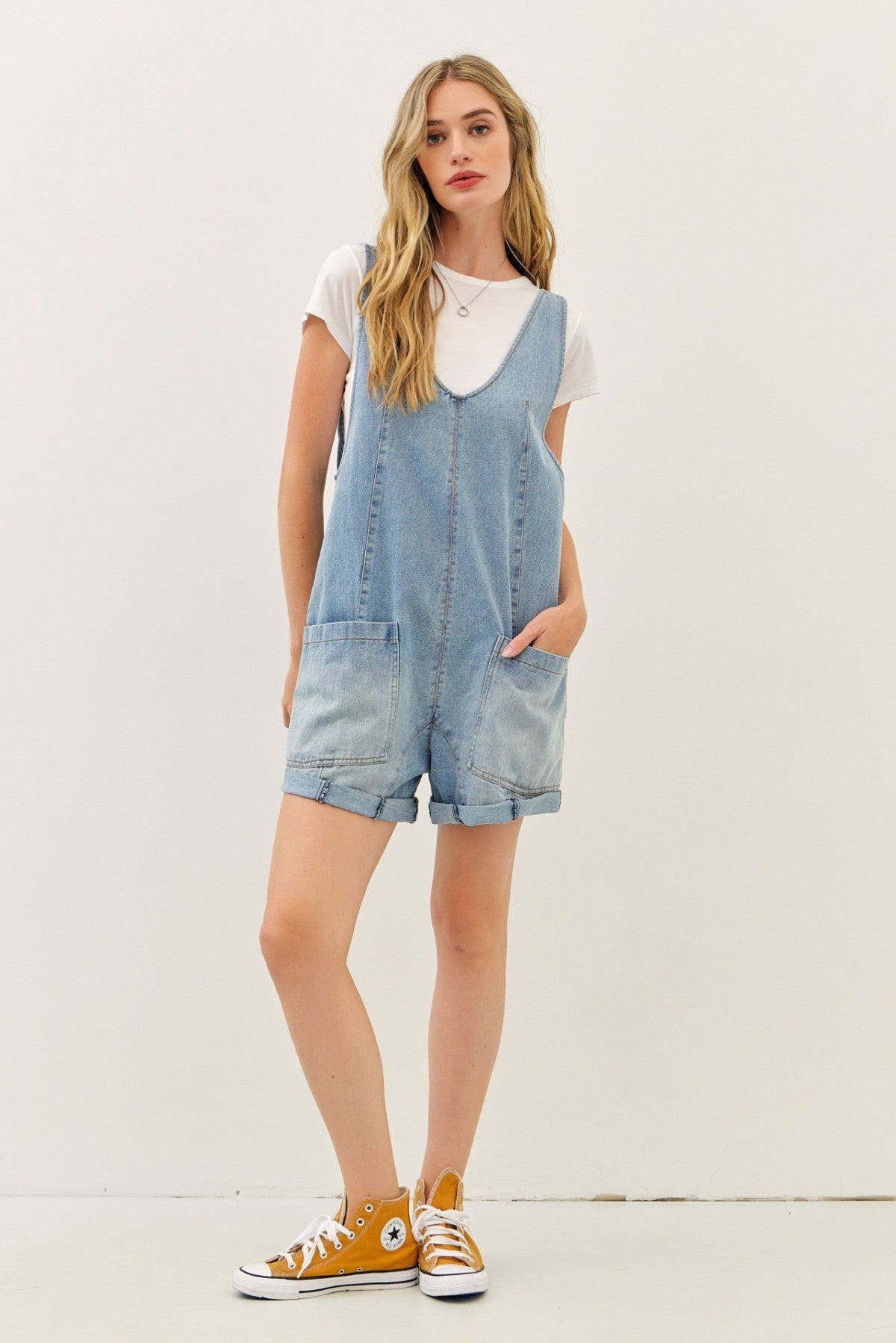 WASHED DENIM ROMPER WITH FRONT POCKETS